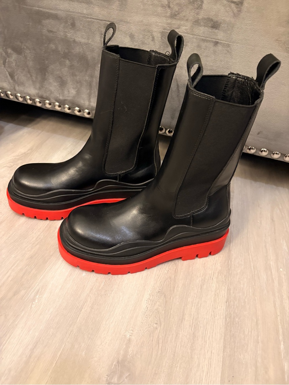Bottega Veneta Black Leather Combat Boots with Red Lug Sole